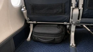 Slim backpack fitting under an airplane seat as a personal item