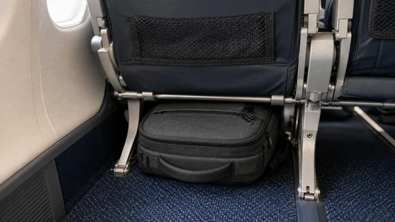Slim backpack fitting under an airplane seat as a personal item